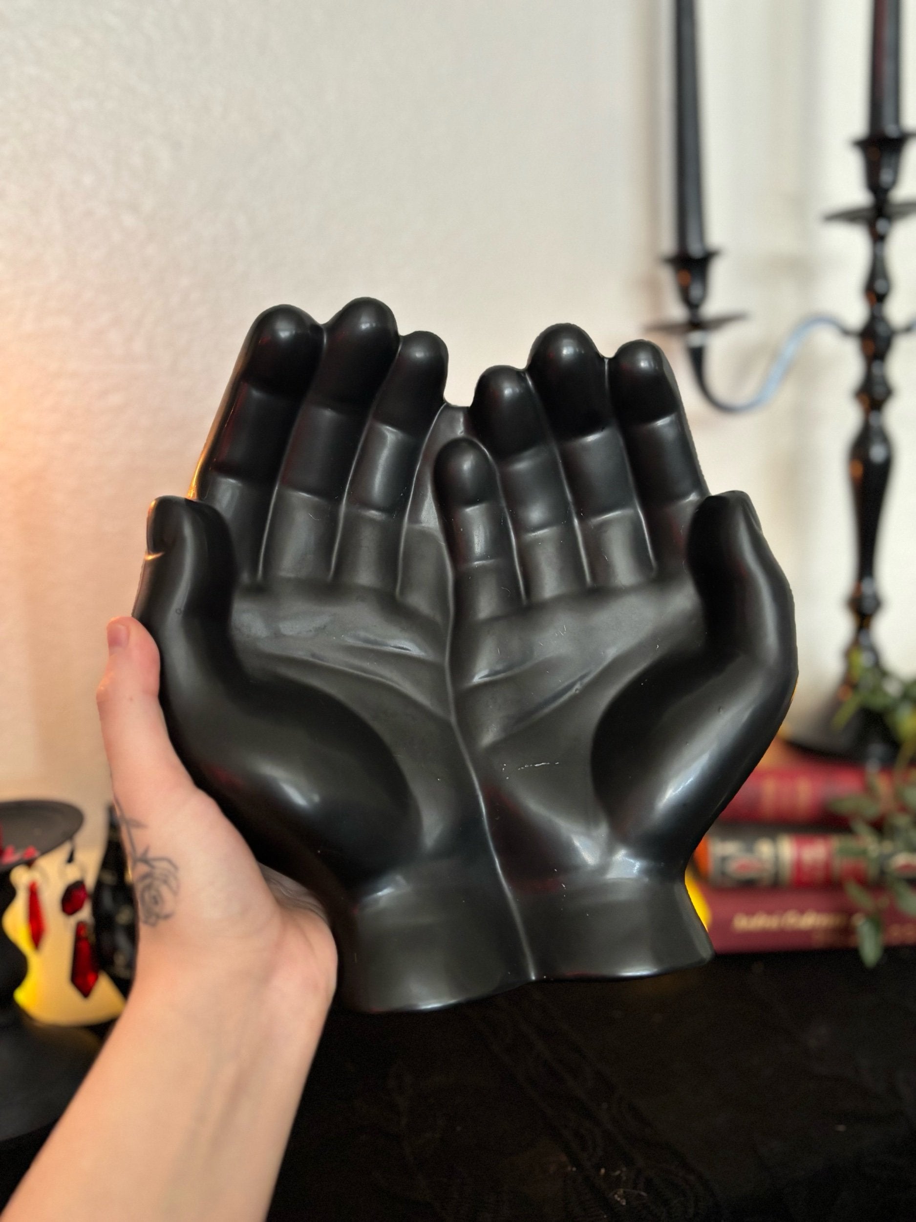Hands Offering Dish